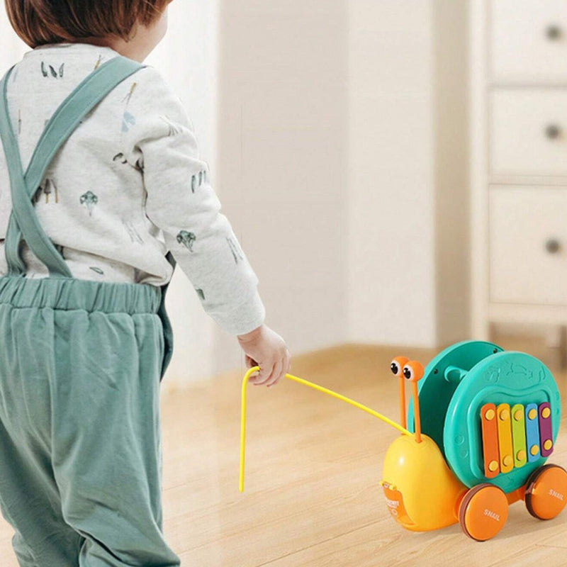 Snail Pull Toy with String & Music - SLT58079 - Planet Junior